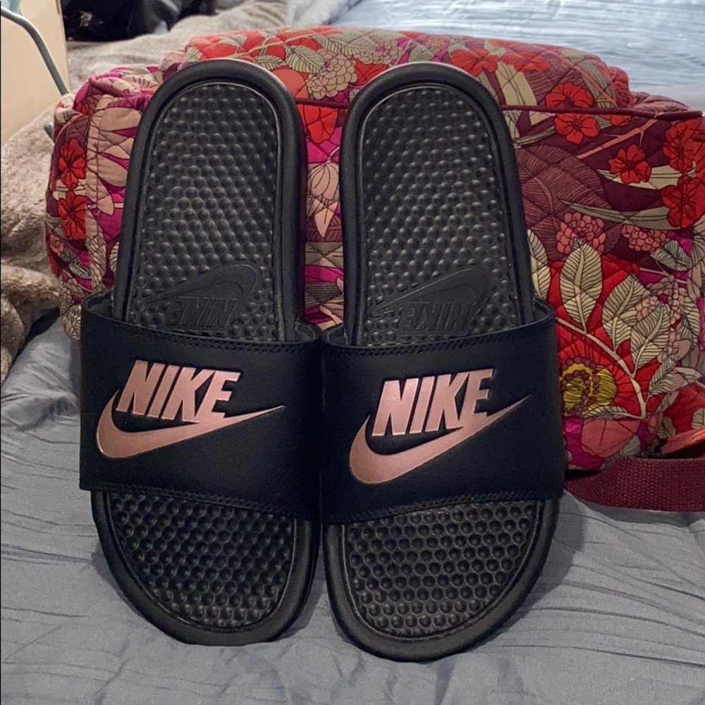 Women size 9 Nike Slides